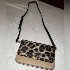 Nine West Cheetah Print Crossbody Wallet. Adjustable Strap. Many Card Slots Never Worn In Great Condition Smoke Free Home. Leopard Print Crossbody Shoulder Bag With Adjustable Strap, Leopard Print Crossbody Shoulder Bag With Removable Pouch, Leopard Print Crossbody Bag With Removable Pouch, Leopard Print Crossbody Bag With Detachable Strap, Leopard Print Shoulder Bag With Adjustable Strap For On-the-go, Leopard Print Crossbody Bag, Brown Crossbody Purse, Grey Crossbody Bag, Black Gold Chain