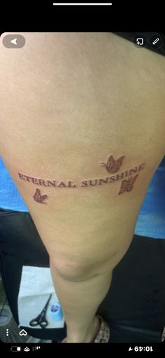 the back of a woman's leg with an inscription on it that says, eternal sunshine