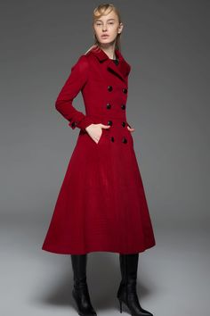 The long wool coat is made of 60% wool, others are polyester. it has a polyester lining. the winter coat is closed by front double buttons. Fitted style prefect show womens body curve. A great classic coat is essential to complete any fall or winter outfit and this wool red coat is just the one. The sleek and tailored look of this woman's coat will give you a polished but modern look at all times. This is a warm and comfortable coat that is just as functional as it is stylish. This classic coat Formal A-line Outerwear For Fall, Formal A-line Fall Outerwear, Solid A-line Outerwear For Fall, Fitted Solid Color Double-breasted Wool Coat, Fitted Wool Coat With Stand Collar For Fall, Formal A-line Wool Coat For Fall, Fitted Long Pea Coat With Buttons, Fall A-line Single Breasted Outerwear, Red Double-breasted Outerwear For Fall