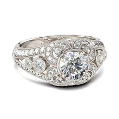 a diamond engagement ring with an intricate design