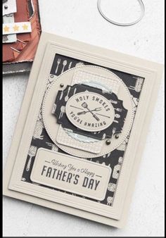 a father's day card next to a pair of scissors