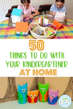 two children sitting at a table with paper owls and the words 50 things to do with your