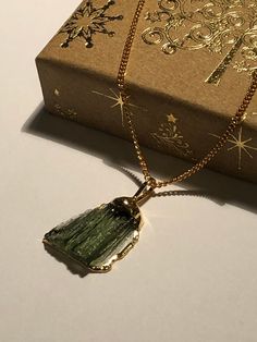 Cute golf charm, gold pendant with real Moldavite - natural gem after a meteorit fall in our country! Greetings from the outer space! Great talisman, best chakra power gem stone, healing stone. Genuine raw moldavite pendant  24k GOLD plated - top quality | Raw Czech Moldavite | Green tektite | Handmade jewelry - directly from Bohemia, Czech Republic - we are based in Bohemia! - Authenticity card included.   One side is perfectly polished to see the best structure of the gem and the other is raw. Moldavite Necklace, Moldavite Pendant, Minimalist Gifts, Healing Stones, Czech Republic, Gold Pendant, Gift For Him, Charm Necklace, Chakra