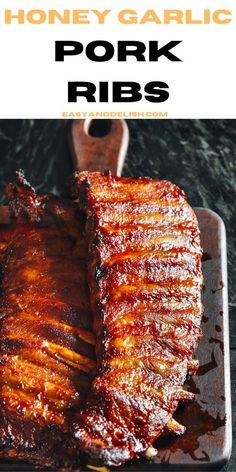 honey garlic pork ribs on a baking sheet with text overlay that reads honey garlic pork ribs