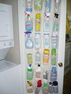 an open refrigerator filled with lots of cleaning products