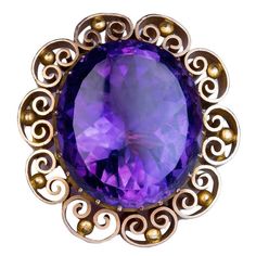 Dated 1873 A 14K yellow matte gold brooch features an oval Russian amethyst (24 x 21 x 12.4 mm, approximately 33 carats) surrounded by ornate openwork bezel. Marked on pin with date ‘1873’, maker’s initials and 56 zolotnik old Russian gold standard. Size 35 x 33 mm (1 3/8 x 1 1/4in.) Amethyst Brooch, Purple Brooch, Pins Brooch, Victorian Brooch, Gemstone Brooch, Jewelry Victorian, Antique Pins, Jewelry Purple, Antique Gold Jewelry