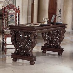 an ornately carved wooden desk and chair in a large room with marble flooring