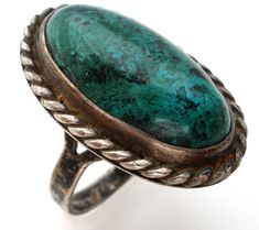 Vintage Gemstone Jewelry - This is a handmade sterling silver ring with a green turquoise stone. It is a size 6.5, hallmarked Sterling, face measures 1" by .63", weighs 7.4 grams, some tarnish. Green Turquoise Ring With Patina In Sterling Silver, Green Oval Ring With Patina, Antique Green Turquoise Ring As Gift, Green Sterling Silver Ring With Patina, Green Rings With Patina, Handmade Sterling Silver Rings, Green Turquoise, Ring Sterling Silver, Handmade Sterling Silver