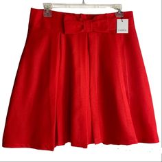 Choies Skirt Nwt Flared Pleated Skirt Bow In Front Hide Away Zipper In Back Lining Underneath Small Snag In Front As Shown In Photo 8 Hardly Noticeable Approximate Measurements Flat Lay Waist 16” Length 20” Smoke And Pet Free Home Red Pleated Bottoms For Winter, Red Pleated Mini Skirt For Party, Red Knee-length Pleated Skirt For Spring, Red Pleated Knee-length Mini Skirt, Red A-line Mini Skirt For Spring, Red Full Mini Skirt For Spring, Red Pleated Winter Skirt, Red A-line Mini Skirt Lined, Elegant Red Party Skort