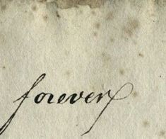 an old piece of paper with the word forever written in cursive writing on it