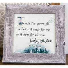 an old frame with a quote on it