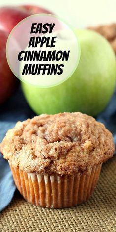 an apple cinnamon muffin next to some apples on a burlly cloth with the words easy apple cinnamon muffins above it