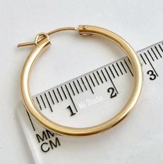 14k gold filled round eurowire earring hoop *Quantity: 2 pieces(1 pair) *Dimension: 29mm *Tube size: 2.3mm 14k Gold Filled Round Hoop Earrings, Yellow Gold Round Hoop Earrings For Everyday, Yellow Gold Hoop Earrings With Lever Back, Nickel-free Yellow Gold Round Hoop Earrings, 14k Gold Round Hoop Earrings With Ear Wire, Earring Hoop, Honolulu, Gold Filled, Gold Bracelet