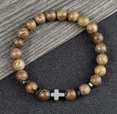 Prayer Men or Women bracelet hematite cross rosary natural stone beads Faith based Jewelry gift Lightweight dainty wooden style bracelet. Faith Based Jewelry, Wooden Beaded Bracelets, Cross Rosary, Natural Stone Beads, Women Bracelet, Faith Based, Rosary, Stone Beads, Womens Bracelets