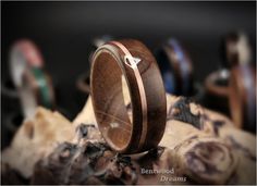 a wooden ring with an arrow on it