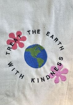 a t - shirt with the earth and flowers on it that says, save the earth with kindness