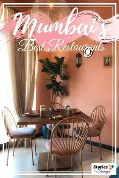 a dining room with pink walls and chairs