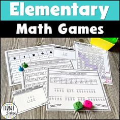 a pile of math games with dices and numbers