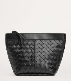 Find BOTTEGA VENETA Medium Leather Prism Pouch on Editorialist. A staple of Bottega Veneta since the '60s, the Intrecciato weave is a consistent and firm reminder of the Italian Houses rich history of craftsmanship. The woven strips of rich calfskin define the Prism pouch, resulting in a refined home for your essentials. Everyday Woven Leather Clutch, Designer Woven Leather Clutch, Elegant Leather Cosmetic Bag For Business, Leather Rectangular Cosmetic Bag For Evening, Leather Evening Cosmetic Pouch, Luxury Leather Bag With Zipper Pouch, Elegant Leather Clutch With Zipper Pouch, Leather Pouch Cosmetic Bag For Evening, Elegant Leather Travel Coin Purse