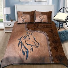 a bed with a horse design on it