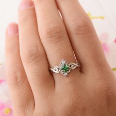 "Vintage style 925 sterling silver art deco emerald promise ring for her, Unique geometric celtic style womens emerald engagement ring WE OFFER UNLIMITED PERIOD INSTALLMENTS PLAN This is a beautiful, stunning, feminine ring that works well for all occasions, styles, and ages. You will love it! Ring information Main stone: Emerald Approximate size: 4x4mm Accent stones: White cubic zirconia Approximate size: 1.5mm (4 stones) Metal type: Silver Metal stamp: 925 Sterling SIlver Customization / Repla Emerald Promise Ring, Art Deco Emerald, Engagement Ring Prices, Promise Ring For Her, Celtic Style, Fancy Gifts, Promise Rings For Her, Emerald Engagement, Silver Art