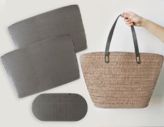 a person holding a woven bag next to two pieces of black and white material on a table