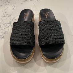 Women’s Black Size 9 Sandal. Woven Strap Across The Toes. Never Worn. Black Sandals With Woven Sole For Beach, Black Casual Wedge Sandals With Round Toe, Black Round Toe Wedge Sandals, Black Round Toe Casual Wedge Sandals, Casual Black Wedge Sandals With Round Toe, Comfortable Black Sandals With Woven Sole, Black Closed Toe Sandals For Outings, Comfortable Black Wedge Sandals For Beach, Black Summer Wedge Sandals