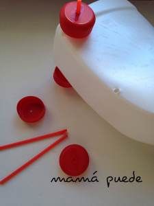 a white cake with red candles on it