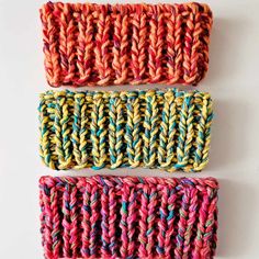 three crocheted coasters sitting next to each other