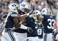 the penn football team is congratulating each other after their win over tcu