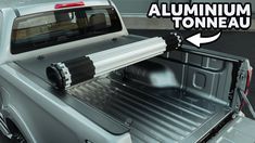 an aluminum tonneau truck with the bed open