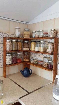 a kitchen with shelves filled with jars and containers