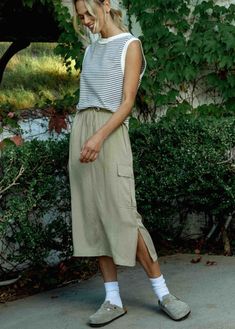 wishlist cargo midi skirt with side slit elastic waist drawstring cargo pocket taupe tan Midi Cargo Skirt, Cargo Midi Skirt, Thrift Inspo, Cargo Skirt, Midi Length Skirts, Cargo Pocket, Summer Ready, Comfort Style, Pocket Detail