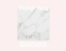 a white marble tile with the words vintage roses on it in front of a pink background