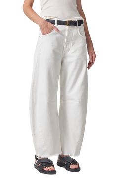 A superhigh waist and structured, curved wide legs cut a dramatic silhouette in these oversized, ankle-grazing jeans crafted from nonstretch denim. 26" inseam; 20" leg opening; 12 3/4" front rise; 15" back rise (size 29) Button fly Five-pocket style 100% cotton Machine wash, tumble dry Made in the USA Chic Wide Leg Pants With Five Pockets, Modern High-waisted Wide Leg Pants, Chic Wide Leg Cropped Jeans, Modern Wide Leg Cropped Jeans, Chic Cropped Wide Leg Pants With Five Pockets, Modern Wide-leg Cropped Jeans For Work, Modern Wide Leg Cropped Jeans For Spring, White Wide Leg Cropped Jeans, Chic White Wide Leg Cropped Jeans