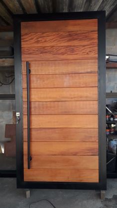 a large wooden door in a garage