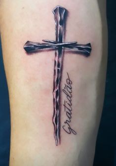 a cross with the word faith written on it