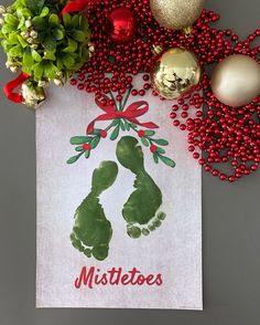 a christmas card with the word mistette's on it and ornaments around it