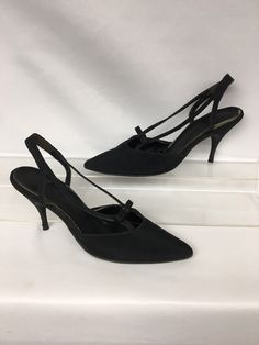 "1960s Black Faille Pointy Toe Strappy Vintage Heels with Bow /Rhinestone accent by Qualicraft American made Tag/Label: QualiCraft Size Label: none Upper Material: Black faille over leather Sole: Painted leather ✂------ M E A S U R E M E N T S ------- Best Fit: US 6.5, EU 36.5, UK 4.5 Insole total Length: 9 3/8\" (including point) Ball Width: 3\" Heel height: 3 1/2\" Please compare these measurements with a pair of your own shoes in a similar style (i.e. pointy) to ensure a proper fit. If you ne Retro Ankle Strap Heels For Formal Occasions, Retro Heels For Party, Vintage High Heels For Party, Vintage 4-inch Heels For Evening, Retro Almond Toe Heels For Party, Vintage Pointed Toe Evening Heels, Vintage Pointed Toe Heels For Evening, Retro Pointed Toe Evening Heels, Vintage Evening Heels With Pointed Toe