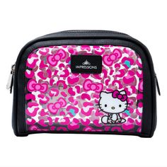 Impressions Vanity presents Hello Kitty double zipper cosmetic case. Having the right carry on bag for your most valued products is essential for anyone. Our Hello Kitty makeup bag provides you with all the protection that you need while looking extravagantly attractive. Our makeup bags have a high quality faux leather outer shell to provide the required strength to the whole bag. The cosmetic bag also looks very stylish with the Hello Kitty prints all over the exterior. The transparent sides of Compact Black Bag For Personal Use, Compact Black Portable Bag, Compact Black Bags With Zipper Closure, Compact Black Bag With Zipper Closure, Hello Kitty Prints, Hello Kitty Travel, Hello Kitty Makeup Bag, Kitty Makeup, Hello Kitty Makeup