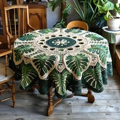 a table with a green and white doily on it