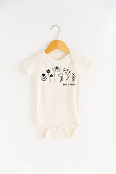 This onesie is the bees knees! Product Info Unisex Fit: See size chart in product images for more details. Measurements can vary up to 1 inch depending on color, material, etc. Cream, Mustard, & Light Grey: 100% Organic Unbleached Cotton // Made in the USA // No harmful chemicals, pesticides, or artificial dyes Mauve and Heather Olive: 25% soft airlume cotton, 25% rayon, 50% polyester (These are lighter weight vs. our 100% cotton options) Apparel Care InstructionsWash in cold water with a natura Onesie Station, Onesie Decorating, Onesie Ideas, Slow Flower, The Bees Knees, T Craft, Artificial Dyes, Natural Detergent