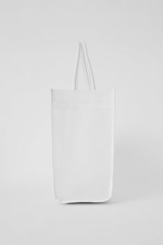 A fresh alternative to your cotton tote, this bag is made from semi-sheer mesh with gentle structure. The extra-large silhouette has a flat bottom with feet, a side pocket, and straps long enough to perch on your shoulder. Overnight trips, farmers market runs, hauling stuff to work—bring this bag along for all of it. Everyday Tote Bag With Mesh Lining, White Mesh Travel Bag, Everyday Mesh Lining Tote Bag, Back Women, Cotton Totes, White Bag, Side Pocket, Farmers Market, To Work