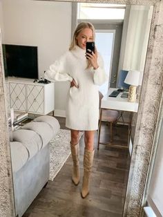 Fall White Sweater Dress, Cream Colored Sweater Dress, White Turtleneck Sweater Dress, Ivory Winter Outfit, White Dress Christmas Pictures, Knee High Boots Outfit Christmas, Beige Sweater Dress Outfit Boots, White Sweater Dress Engagement Photo, Cream Knee Boots Outfit