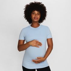 From bump to beyond, this sleek, sweat-wicking top is ready for whatever you are. Unbelievably soft, lightweight fabric has plenty of stretch but recovers its shape for comfort well past the third (or let's be real, the fourth) trimester. Maternity Bump Friendly Relaxed Fit Tops, Stretchy Bump-friendly Everyday Tops, Nursing Friendly Fitted Short Sleeve Tops, Maternity Relaxed Fit Crew Neck Top, Nursing-friendly Fitted Top With Short Sleeves, Casual Fitted Maternity T-shirt, Fitted Nursing Friendly Top With Short Sleeves, Fitted Short Sleeve Nursing-friendly Top, Fitted Bump Friendly Maternity Tops