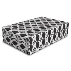 a black and white box with an abstract pattern