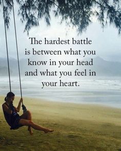 a woman sitting on a swing next to the ocean with an inspirational quote above her