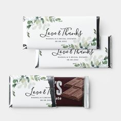 two personalized chocolate bars with leaves on them