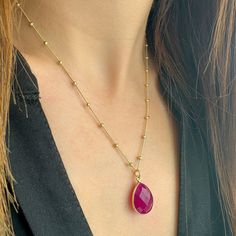 Raw Ruby Pendant on a gold satellite chain. A Genuine Ruby Pendant that is so elegant! Wear this Raw Ruby Necklace as a Stacking necklace! You will love this Genuine Ruby Pendant!   at first sight.   High-Quality  925 Sterling Silver.  ✔️ 24K Gold  Finish✔️ This Real Ruby necklace is great for a  gift for your girlfriend, sister, bridesmaids, or even yourself! Last but not least Ruby is July's Birthstone! Made by hand in Greece.   Moreover, RUBY is a really powerful crystal that promotes self-co Elegant Red Delicate Chain Necklace, Red Beaded Chain Necklace Gift, Red Beaded Chain Necklace For Gift, Gift Red Beaded Chain Necklace, Elegant Red Beaded Chain Necklace, Ruby Necklace With Delicate Chain As Gift, Ruby Necklace With Delicate Chain For Gift, Drop Necklace With Satellite Chain As Gift, Gift Ruby Necklace With Delicate Chain