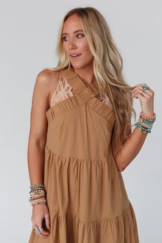 Whether you're dressing up for a special event or just want to add some boho flair to your everyday look, Sun Blissed Tiered Dress is sure to make a statement! This will become one of your go-to pieces because it features: Comfortable medium-weight woven stretch fabric Relaxed babydoll silhouette at a midi length Flattering halter neckline with gathered banded detail Gathered tiers throughout for added body and movement Perfect all-in-one outfit for any occasion! Effortlessly beautiful boho outf Halter Neckline, Tiered Dress, Medium Weight, Special Event, Everyday Look, Midi Length, Special Events, Stretch Fabric, Dress Up